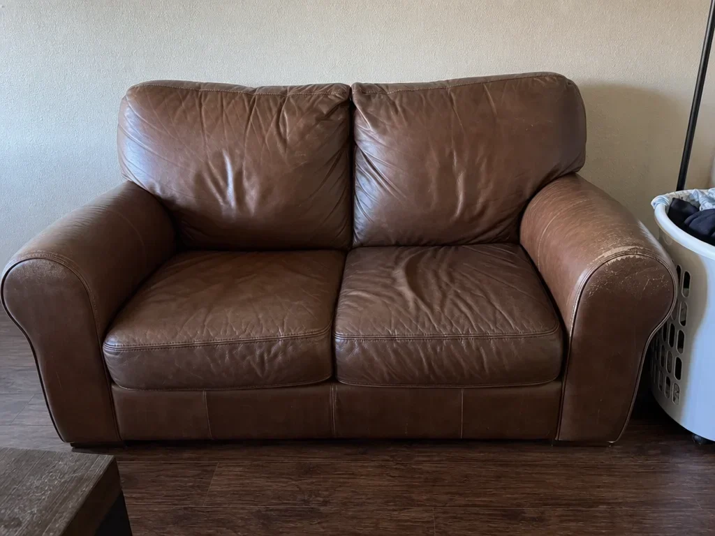 Brown leather loveseat - used image 1