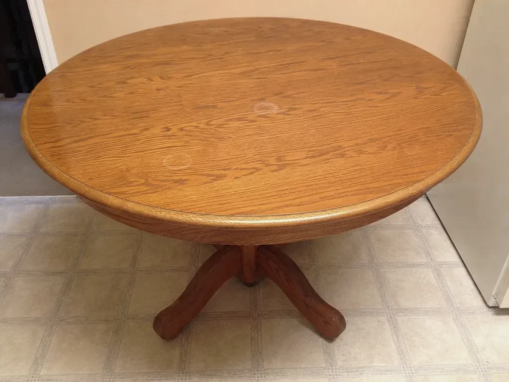Round oak dining table image 1