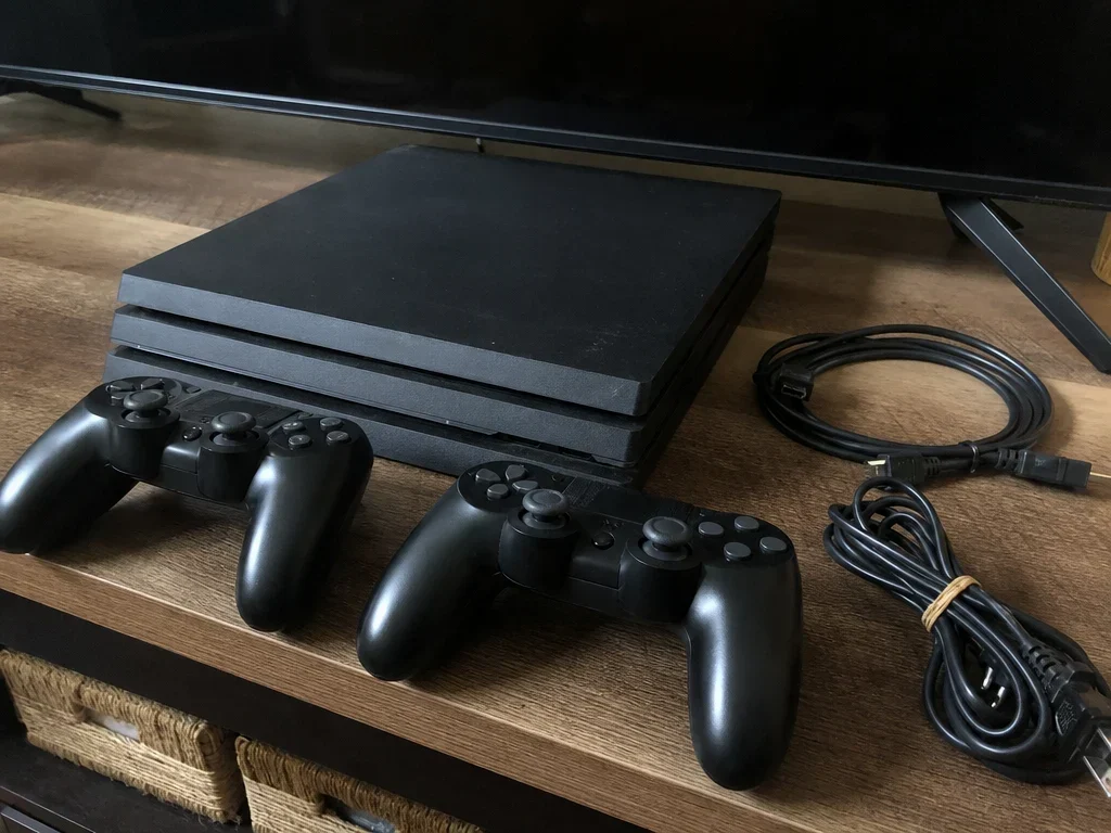 Game console with 2 controllers image 1