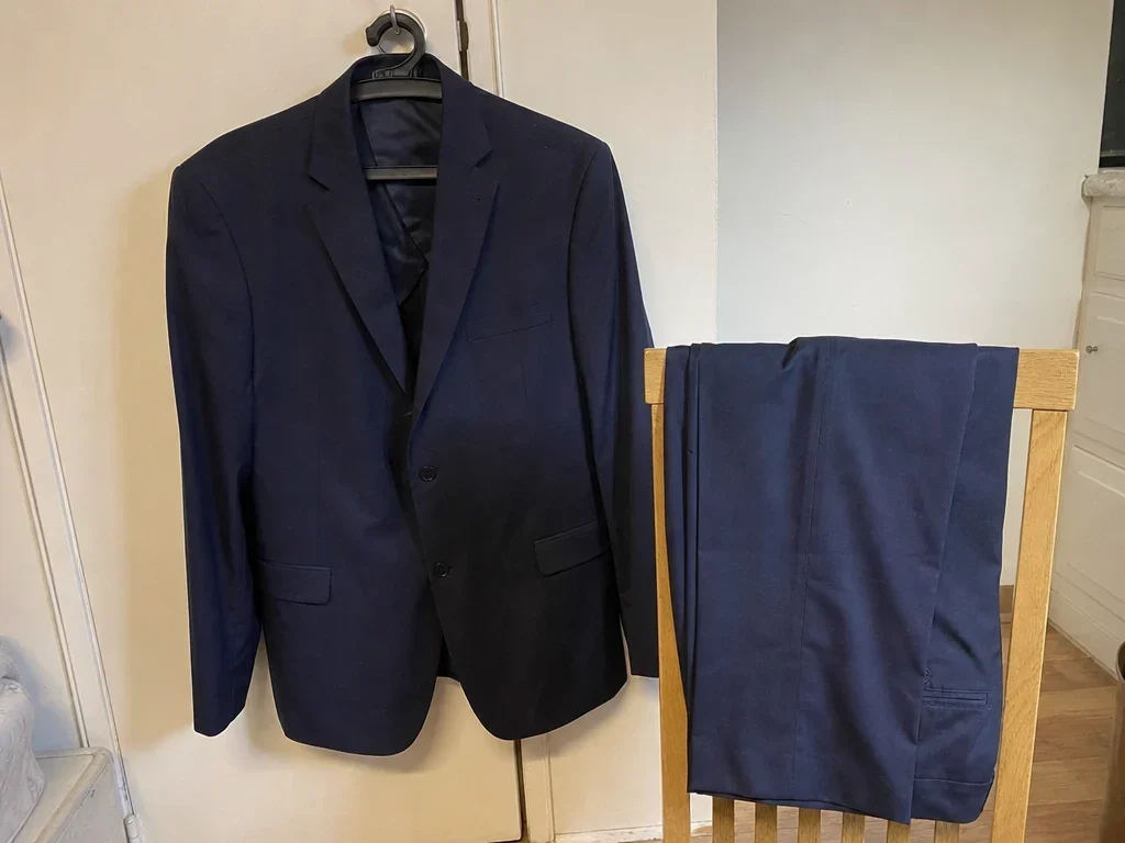 Navy suit jacket and trousers image 1